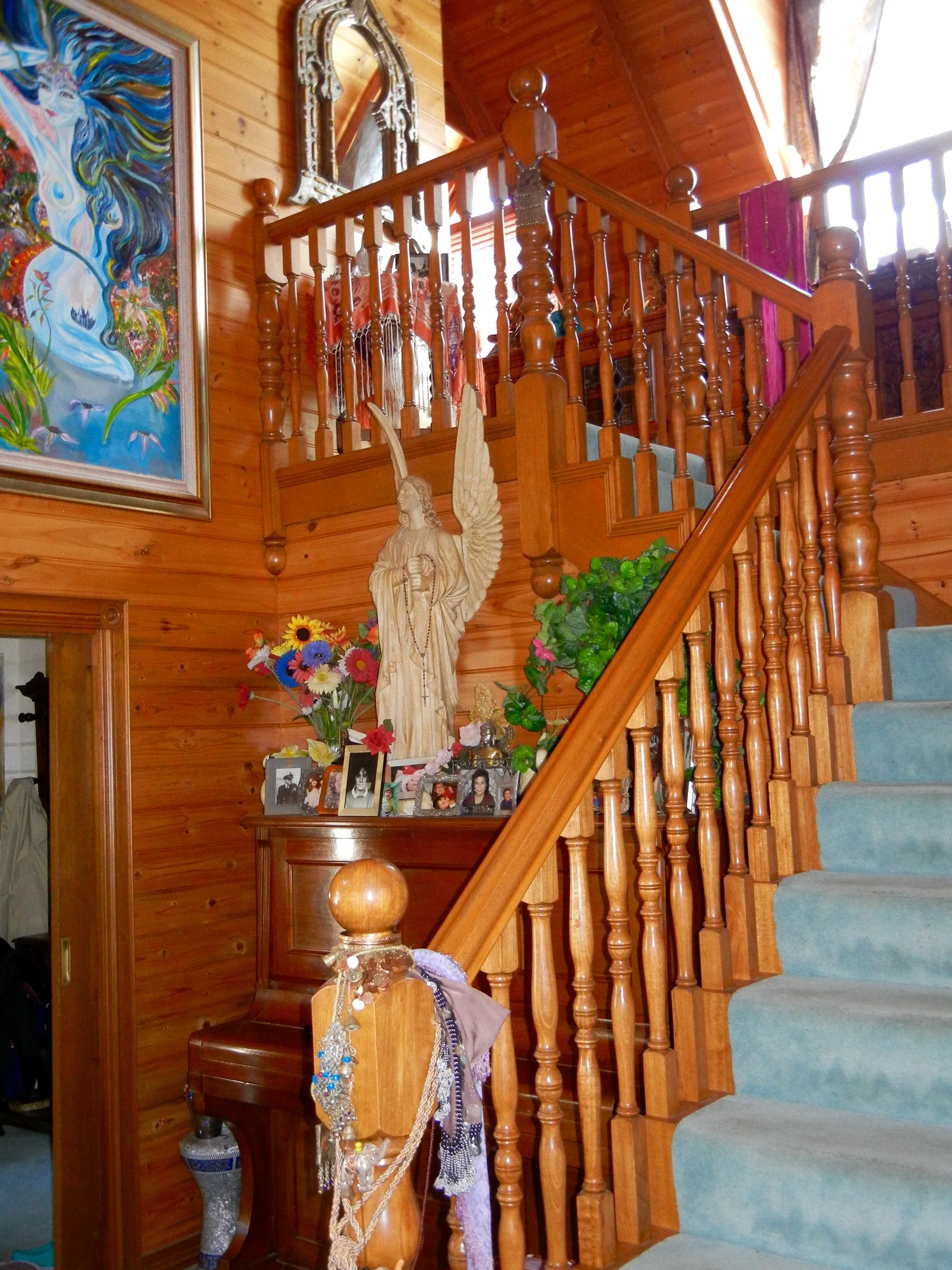 Timber cathedral ceiling with exposed beams inside an original Storybook cottage