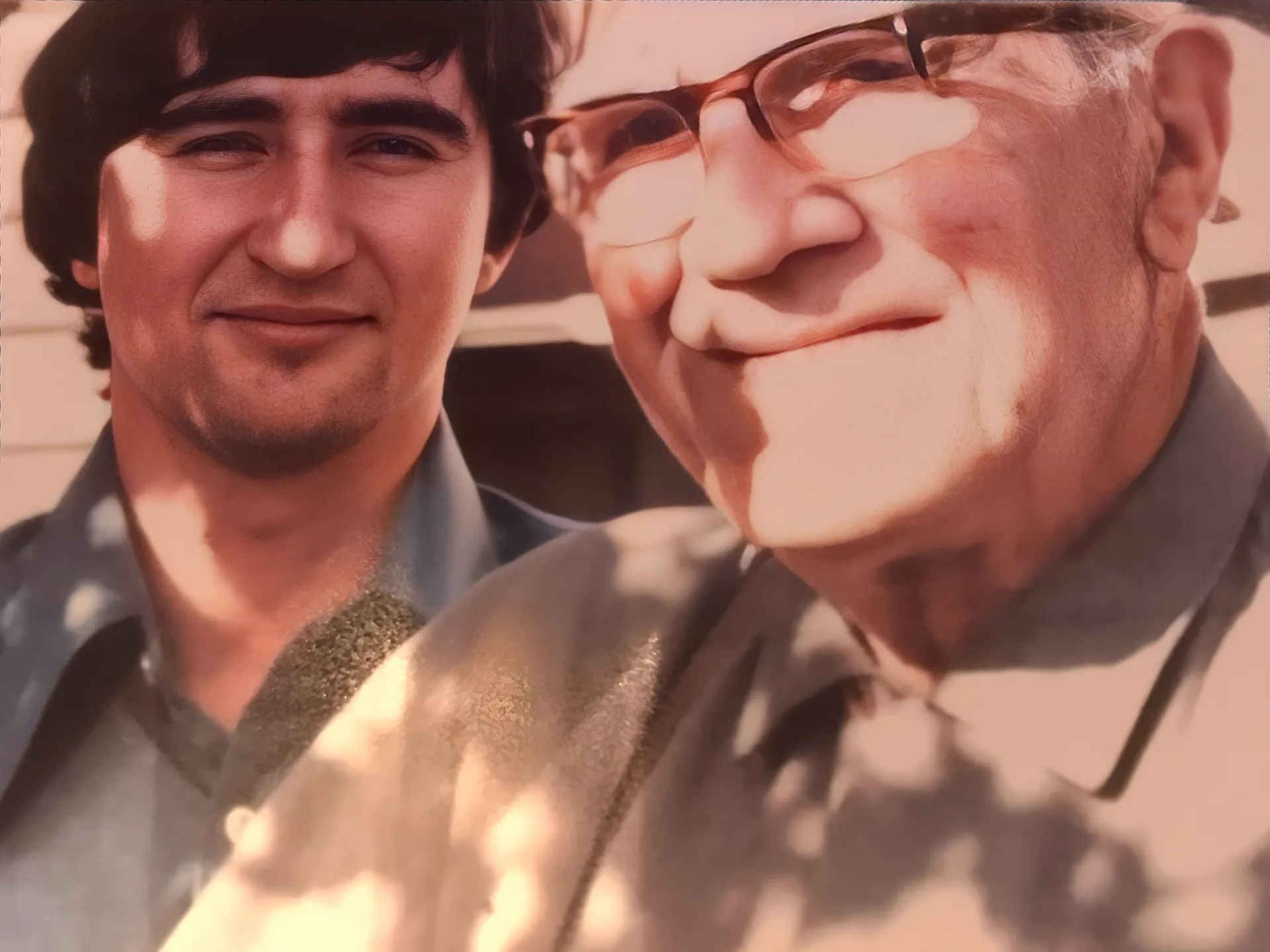 Archival photograph of Phil as a boy with his grandfather Emil